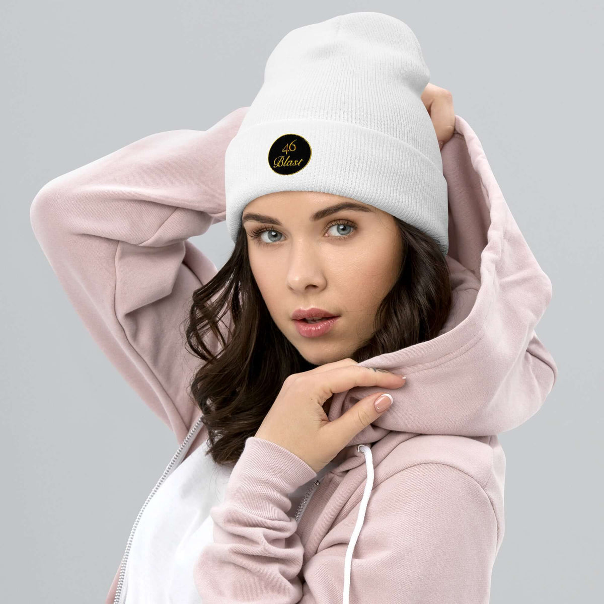 Woman wearing white cuffed Beenie hat